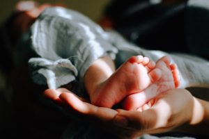 how to prepare for a baby financially baby feet